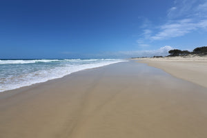 A sunny day on an empty beach at South Stradbroke Island in QLD