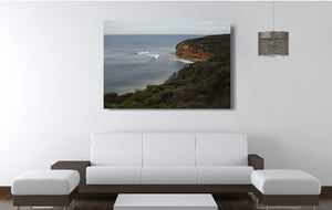 An acrylic print of a calm and overcast day at Bells Beach VIC hanging in a lounge room setting