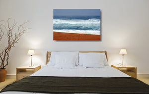 An acrylic print of seagulls against vibrant colours at Bingie Beach NSW hanging in a bed room setting