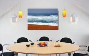 An acrylic print of seagulls against vibrant colours at Bingie Beach NSW hanging in a dining room setting