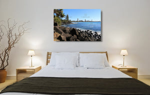 An acrylic print of a sunny day at Burleigh Heads on the Gold Coast in QLD hanging in a bed room setting