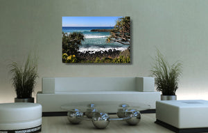 An acrylic print of Burleigh Heads on the Gold Coast, QLD hanging in a lounge room setting