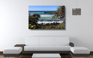 An acrylic print of Burleigh Heads on the Gold Coast, QLD hanging in a lounge room setting