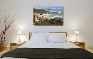 An acrylic print of Gas Bay in WA hanging in a bedroom setting
