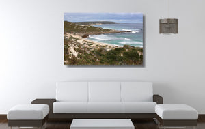 An acrylic print of Gas Bay in WA hanging in a lounge room setting