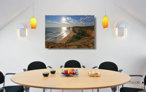 An acrylic print of the Twelve Apostles VIC hanging in a dining room setting