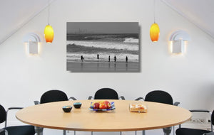 An acrylic print of Kirra Beach on the Gold Coast, QLD hanging in a dining room setting