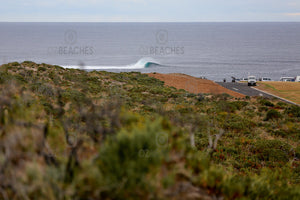 Photograph of a perfect lefthand wave breaking off Surfers Point in Margaret River WA