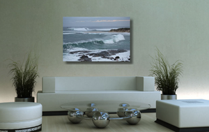 An acrylic print of the rivermouth at Margaret River in WA hanging in a green lounge room setting
