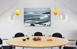 An acrylic print of the rivermouth at Margaret River in WA hanging in a dining room setting