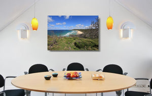 An acrylic print of Alexandria Bay at Noosa QLD hanging in a dining room setting