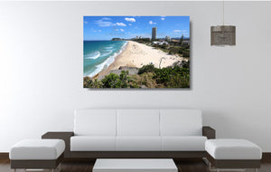 An acrylic print of North Burleigh Beach in QLD hanging in a lounge room setting