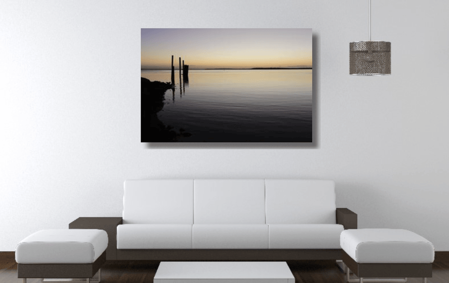 Photograph of a glassy ocean and piers at Dunwich Jetty, North Stradbroke Island QLD