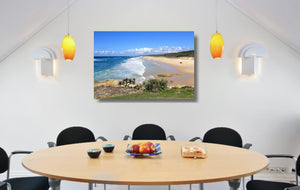 An acrylic print of Point Lookout Beach on North Stradbroke Island QLD hanging in a dining room setting