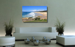 An acrylic print of Point Lookout Beach on North Stradbroke Island QLD hanging in a lounge room setting