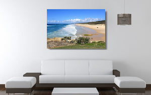 An acrylic print of Point Lookout Beach on North Stradbroke Island QLD hanging in a lounge room setting