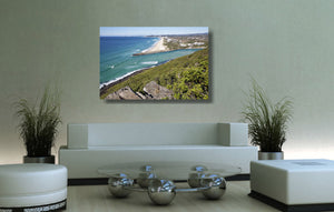 An acrylic print of Palm Beach on the Gold Coast, QLD hanging in a lounge room setting