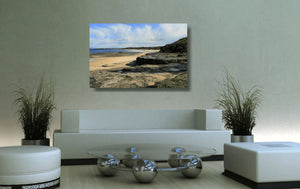 Acrylic print of Racecourse Beach in Ulladulla hanging in a colourful lounge room setting.