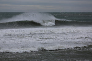 Photograph of a perfect wave breaking at Sandon Point in Wollongong NSW.