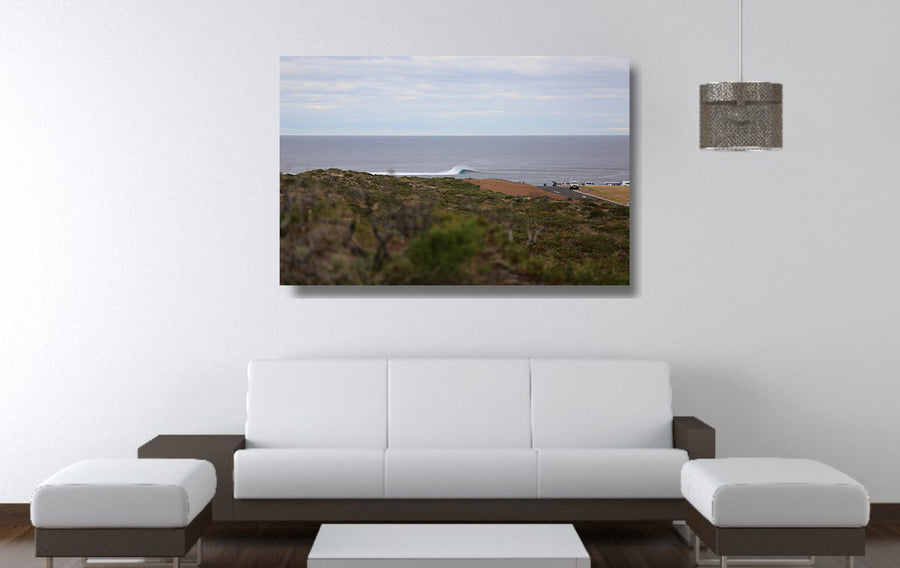 Photograph of a perfect lefthand wave breaking off Surfers Point in Margaret River WA